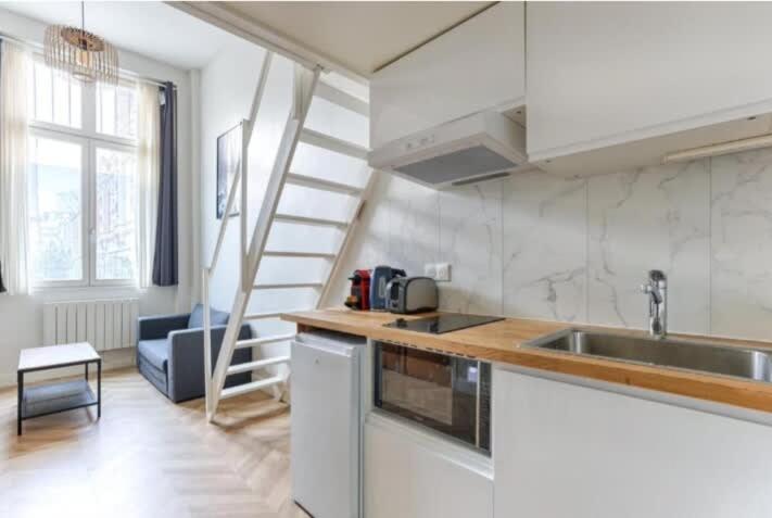 Mezzanine Au Coeur De Batignolles Apartment *